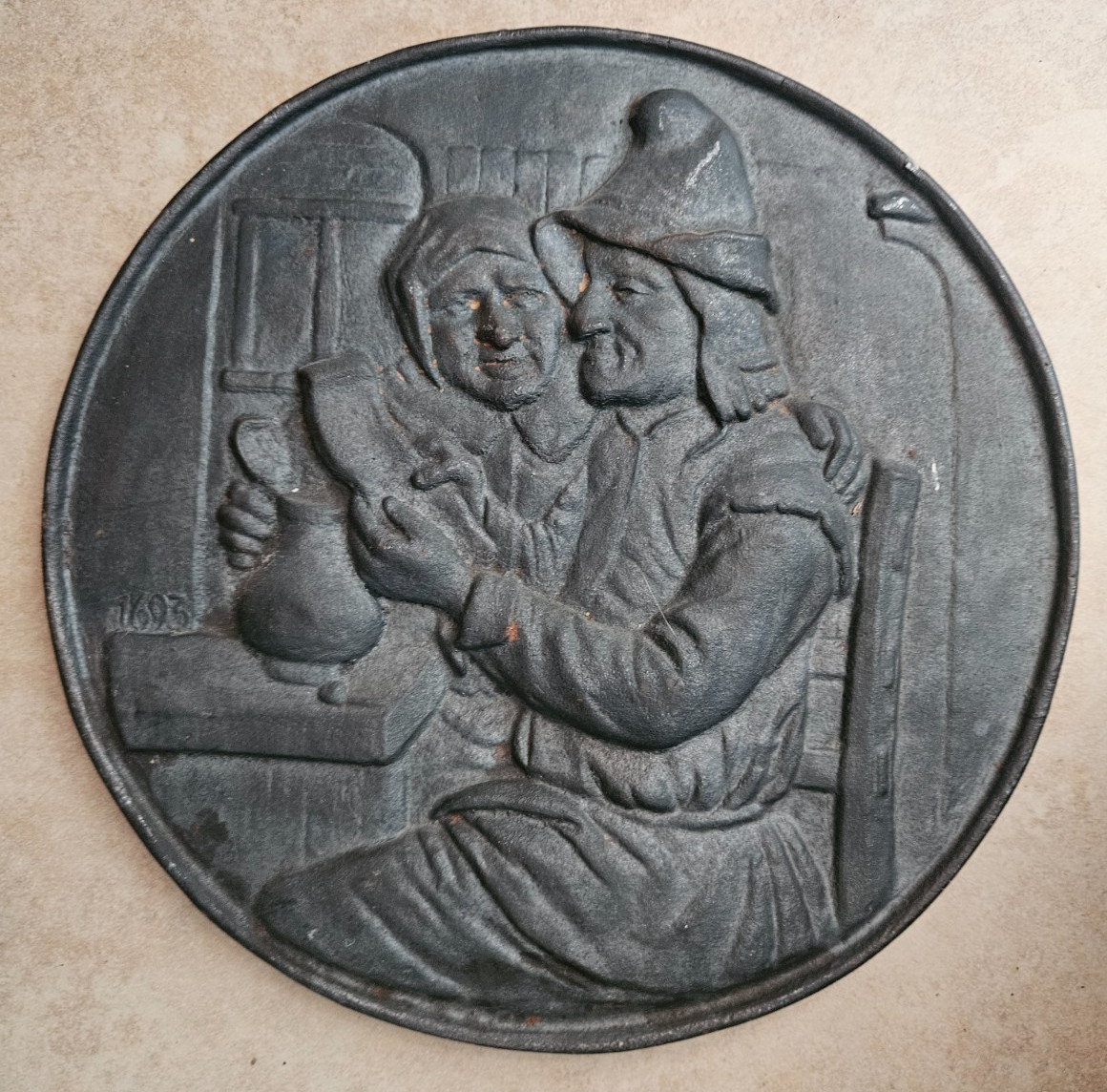 Vintage Heavy Cast Iron German/Dutch Couple Wall Plaque Tavern Scene 11.5 diam