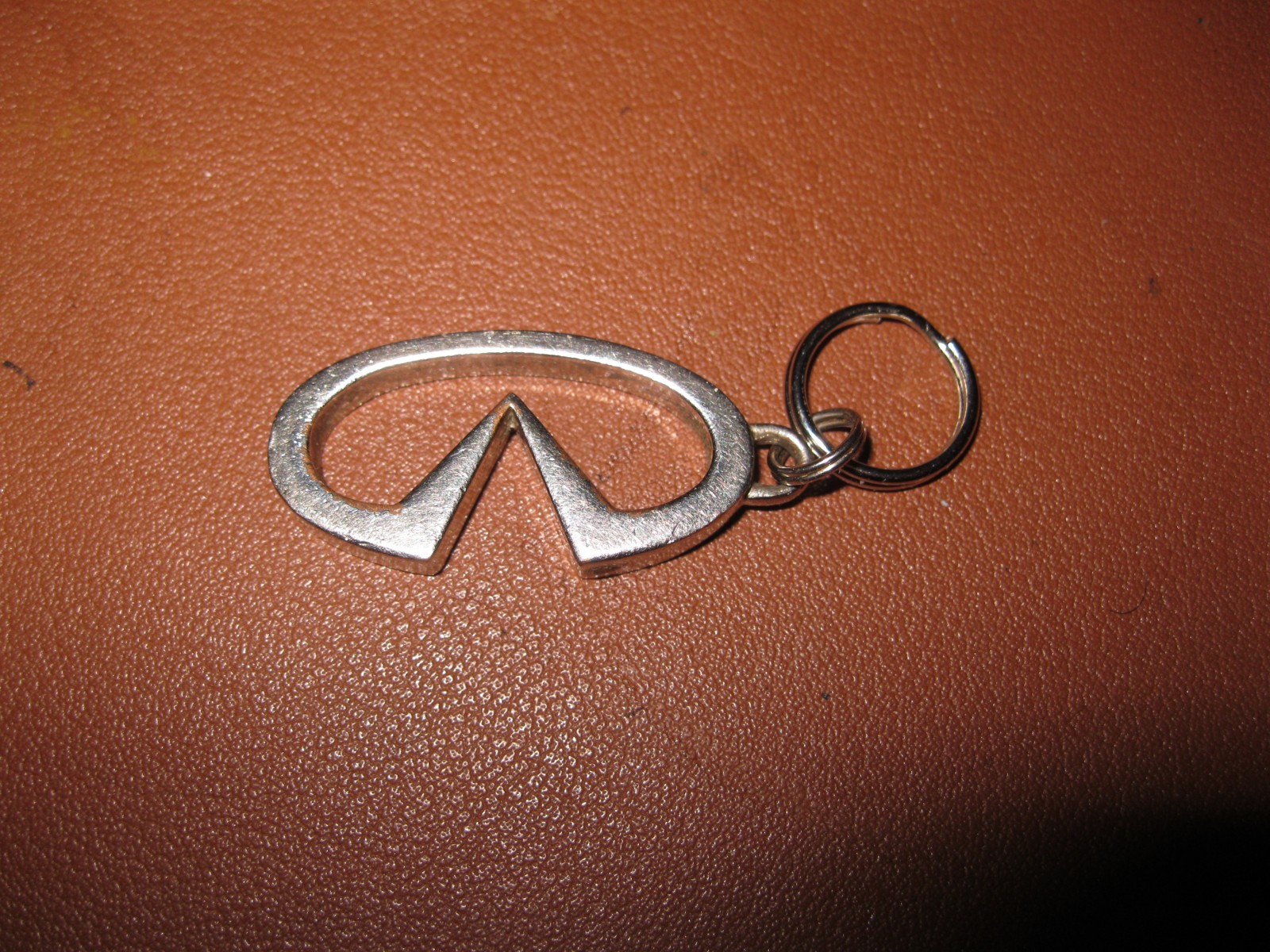 OEM Original Silver  Metal Infiniti Key Chain Logo Emblem, Great Used Condition