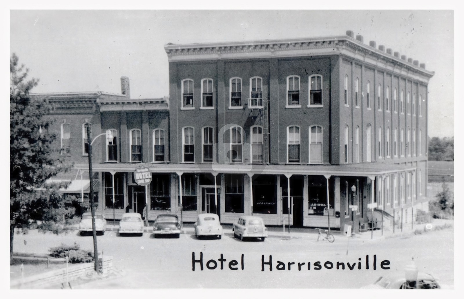 c1950\'s Hotel Building Cars Scene Harrisonville Missouri MO RPPC Postcard COPY