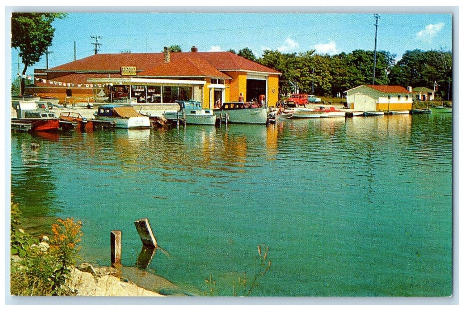 Elks Rapids Michigan Postcard Marine Center Lake River Exterior Building c1960