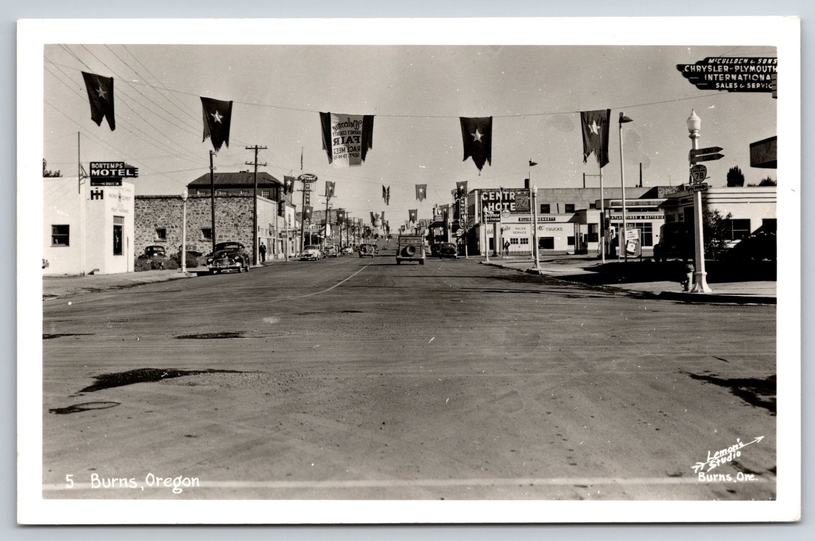Burns Oregon Street View Chrysler Car Dealer Bontemps Motel Fair Real Photo RPPC Burns Oregon Street View Chrysler Car Dealer Bontemps Motel Fair Real Photo RPPC