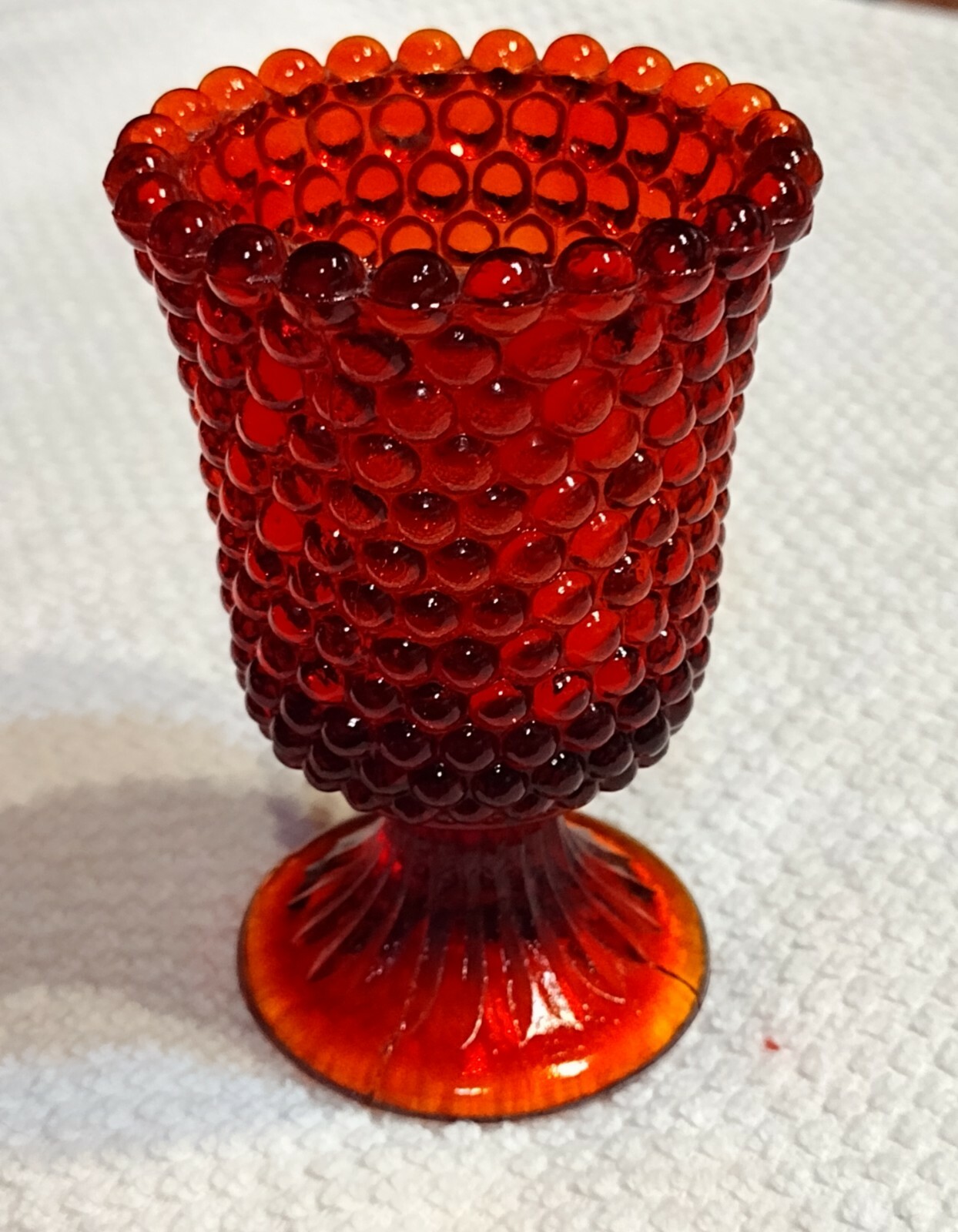 Vintage red Hobnail Fenton glass pedestal/footed candleholder