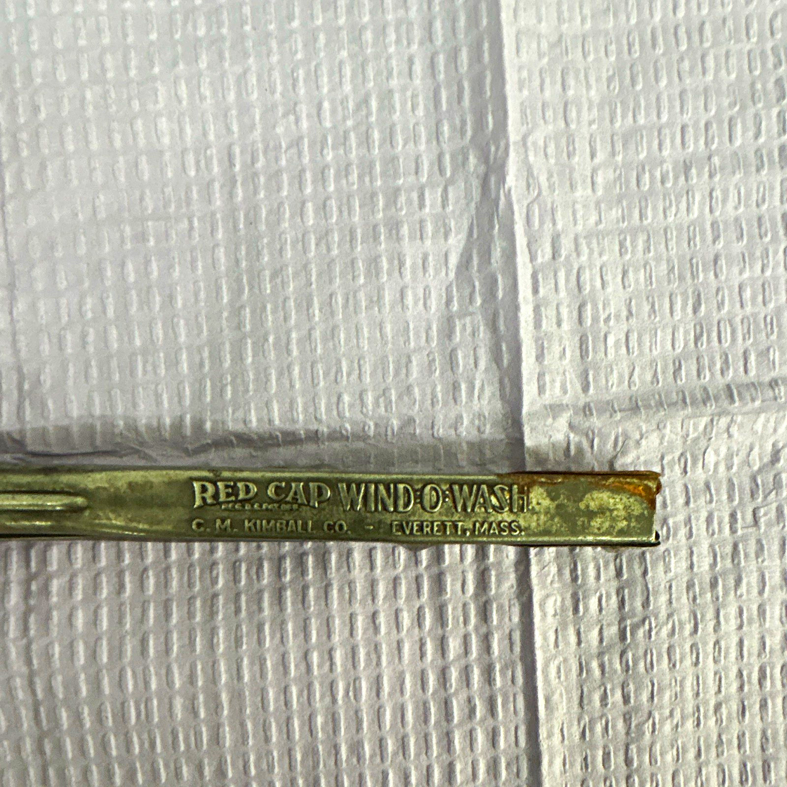 vintage metal advertising tongs CM Kimball Everett Mass Red Cap Wind O Wash