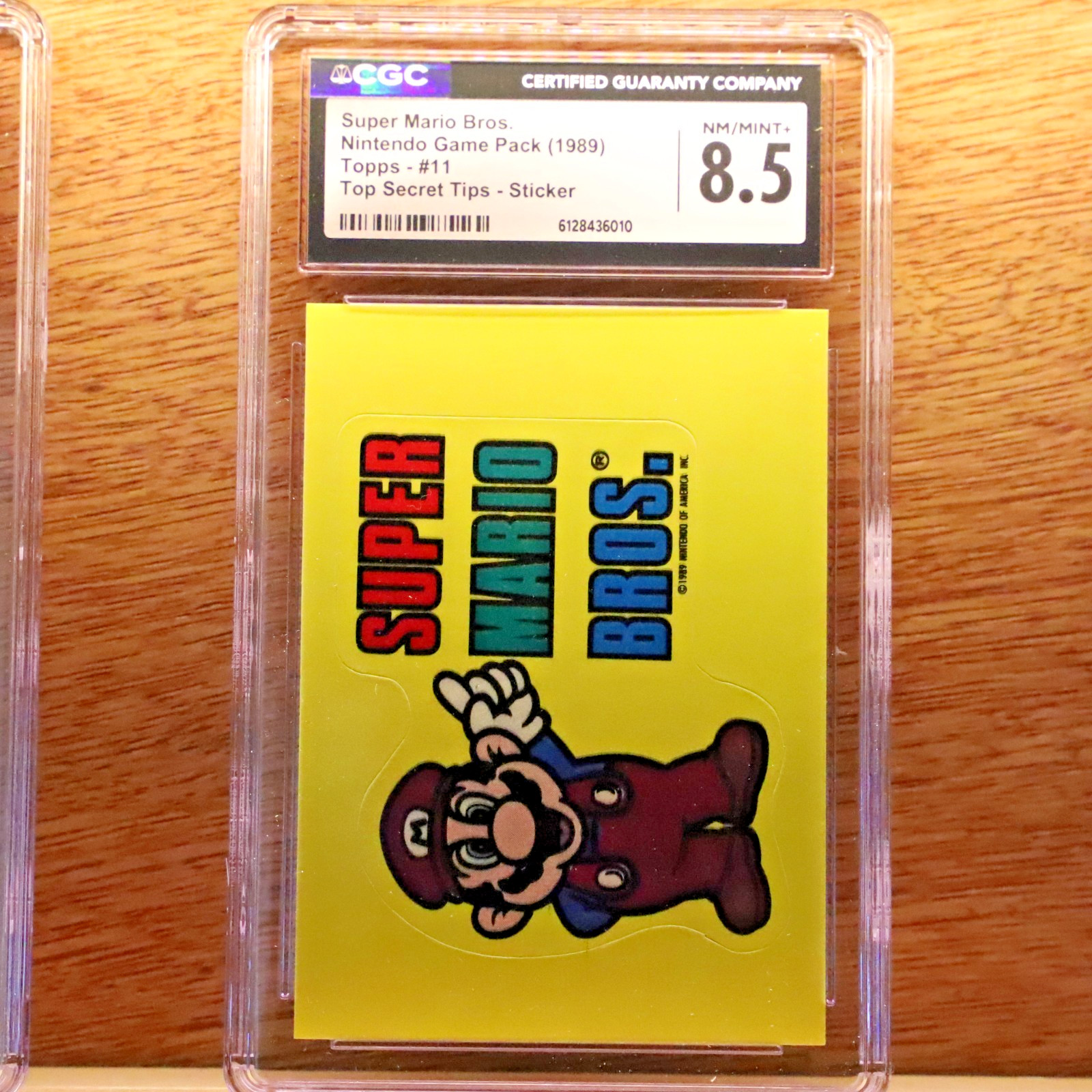 Super Mario Bros. - 1989 Topps Nintendo Top Secret Tips Sticker #11 CGC 8.5 Super Mario Bros. - 1989 Topps Nintendo Top Secret Tips Sticker #11 CGC 8.5