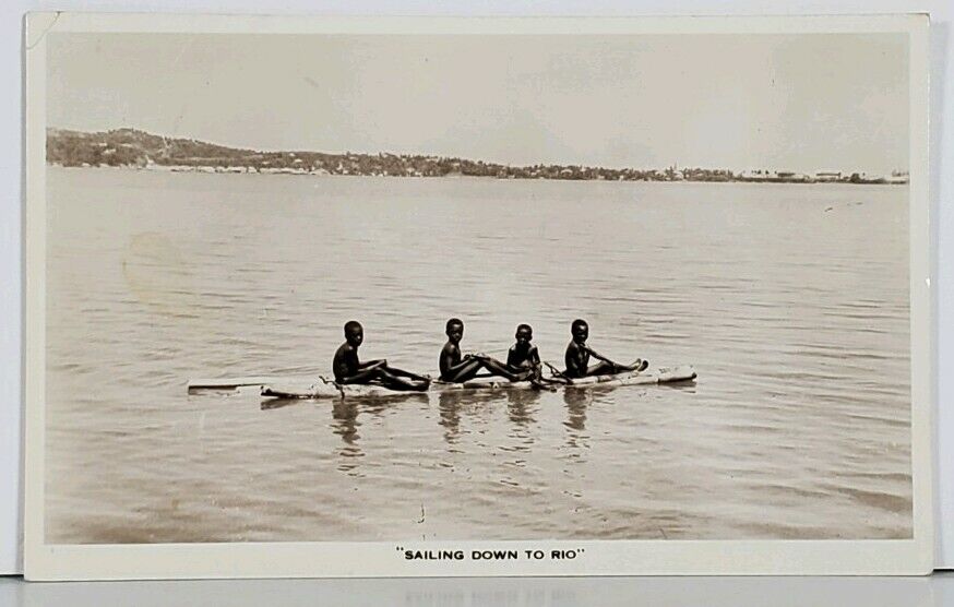 Boys Sailing Down to Rio Floating Wooden Raft Postcard K3