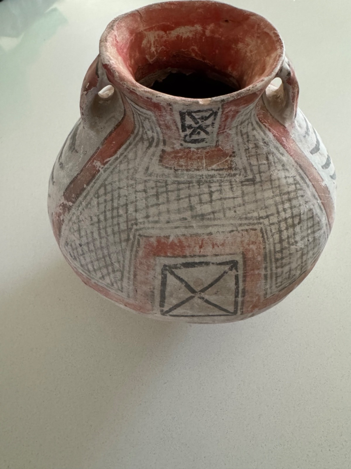 Authentic Zuni Vessel, approximately 6 1/2 inches length, 8 inches wide