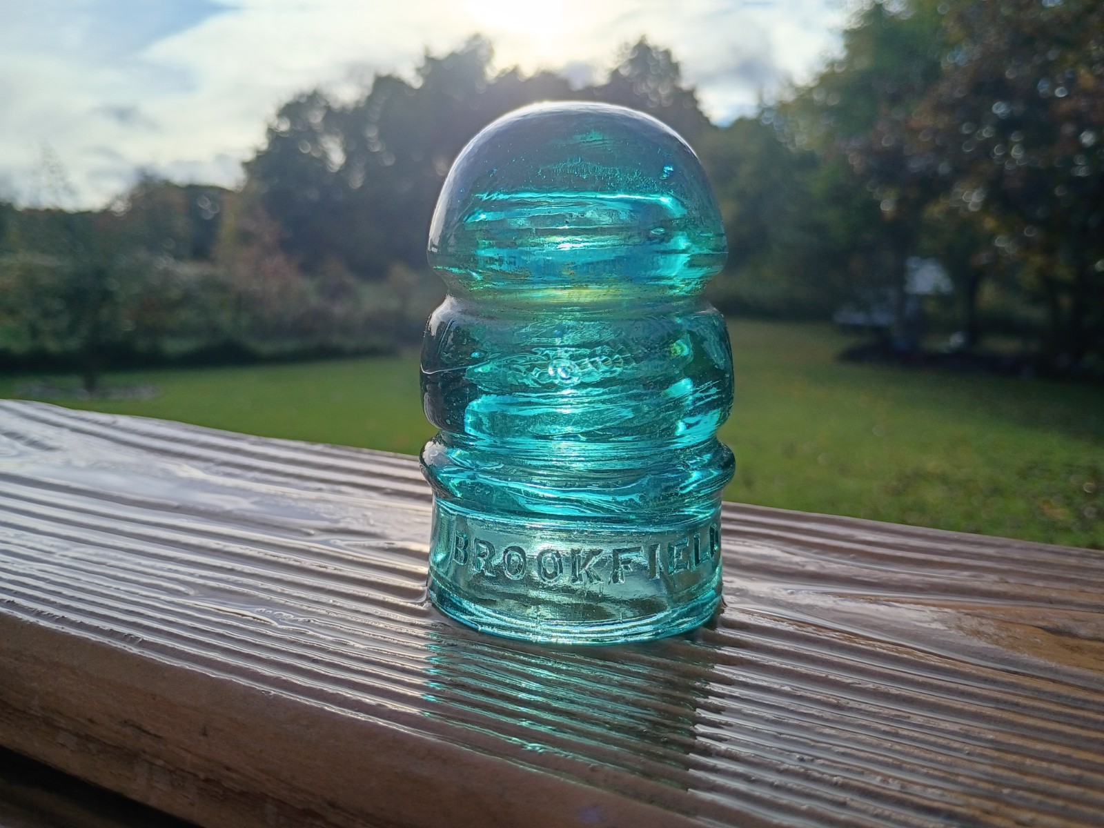 Beautiful aqua CD 112 Brookfield glass insulator. Interesting ghost embossing