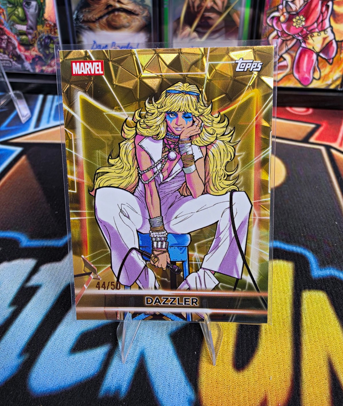 Topps 2026 Topps Chrome Marvel Dazzler #59 Gold Diamonte Serial #44/50 Topps 2026 Topps Chrome Marvel Dazzler #59 Gold Diamonte Serial #44/50