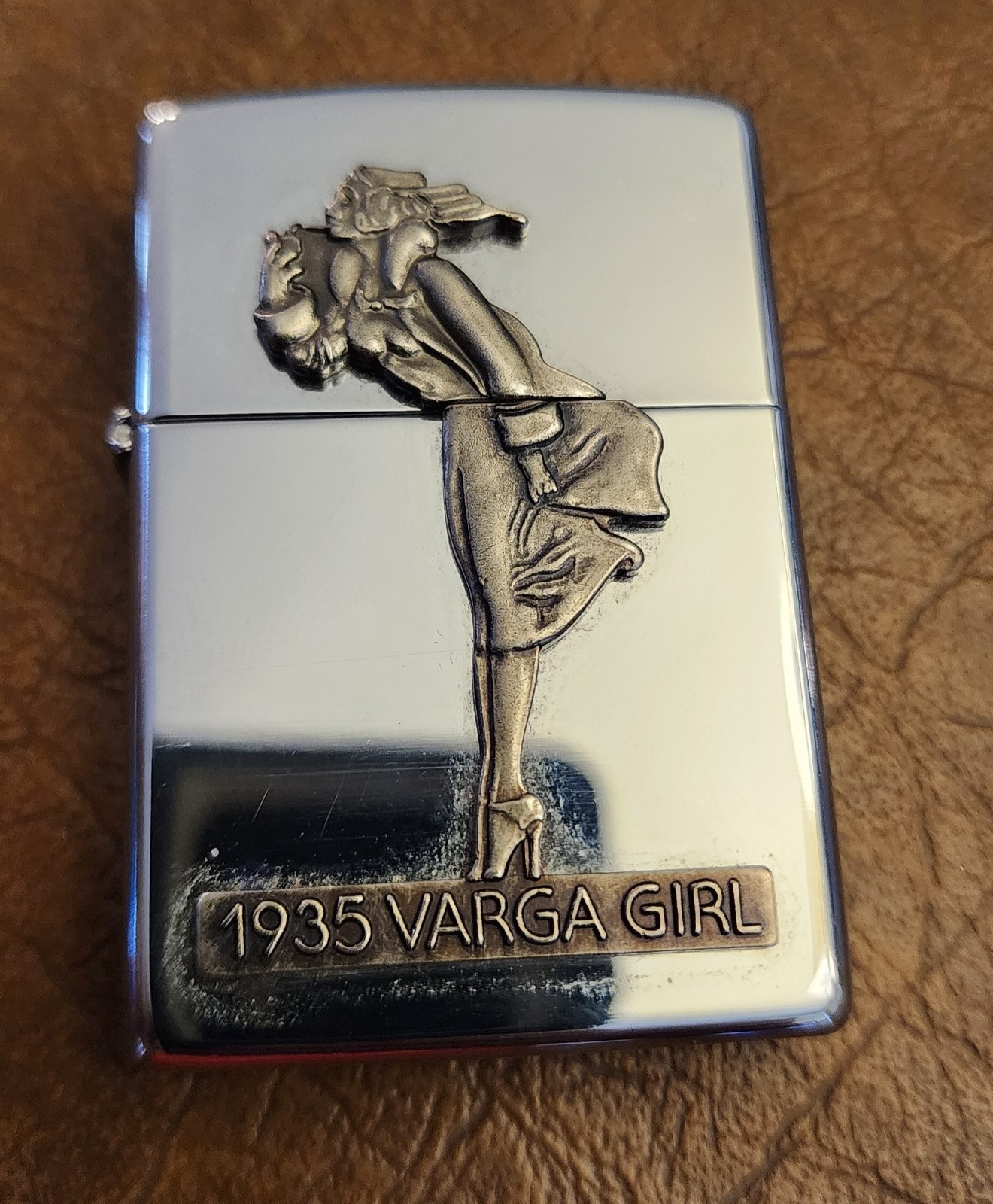 1993 All Chrome 1935 VARGA GIRL Zippo Cigarette Lighter Windy Unused New 1993 All Chrome 1935 VARGA GIRL Zippo Cigarette Lighter Windy Unused New