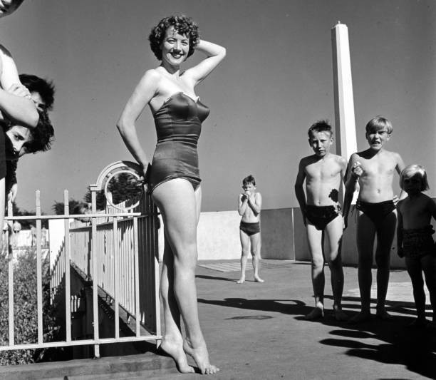 Circa 1960s A model poses in a swimsuit Historic 1960s Old Photo