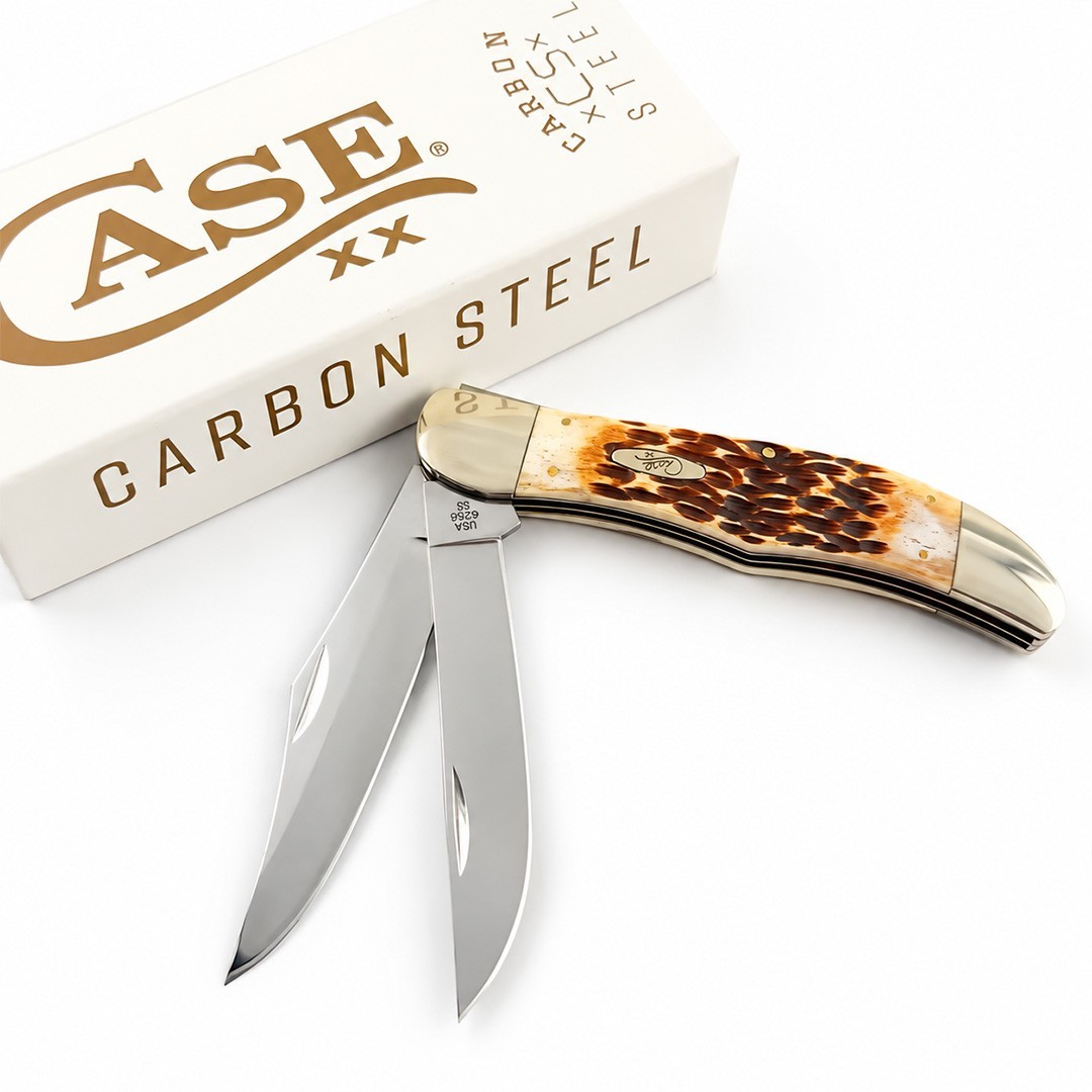 Case XX 30093 Folding Hunter Peach Seed Jig Amber Bone Carbon Steel Pocket Knife