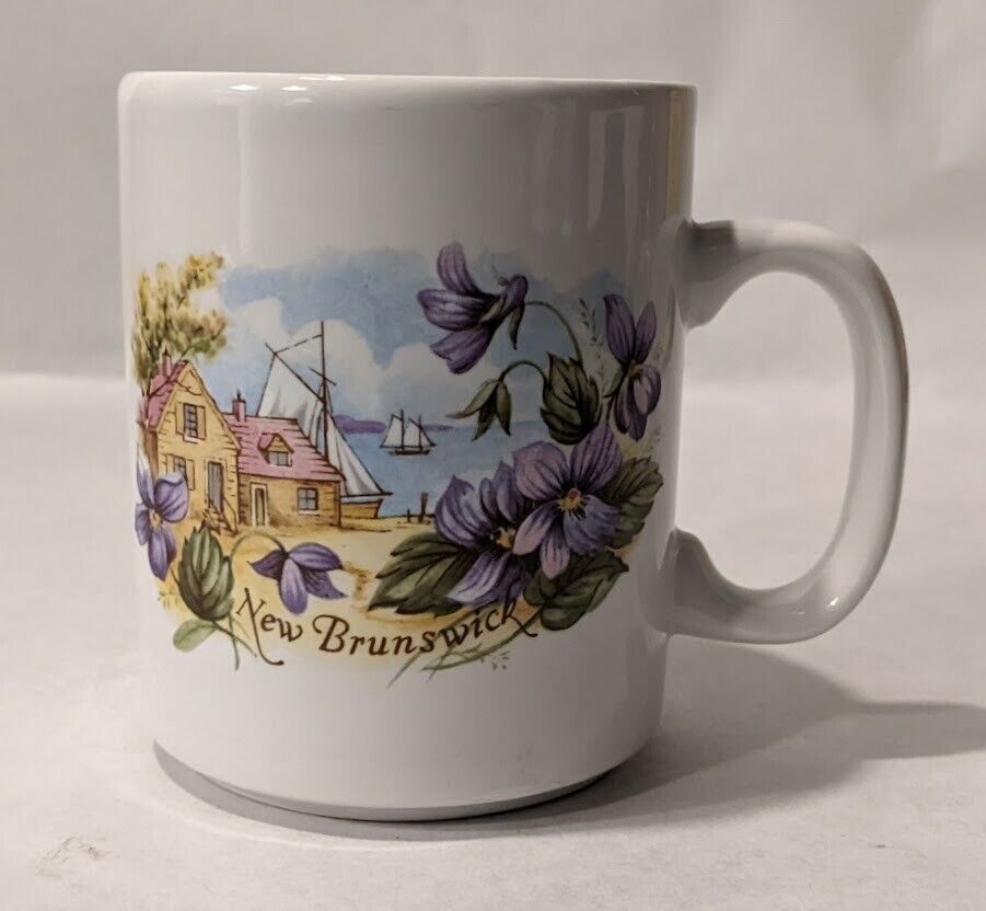 Heron Cross Pottery White Coffee Mug with a New Brunswick Sea Side Scene.