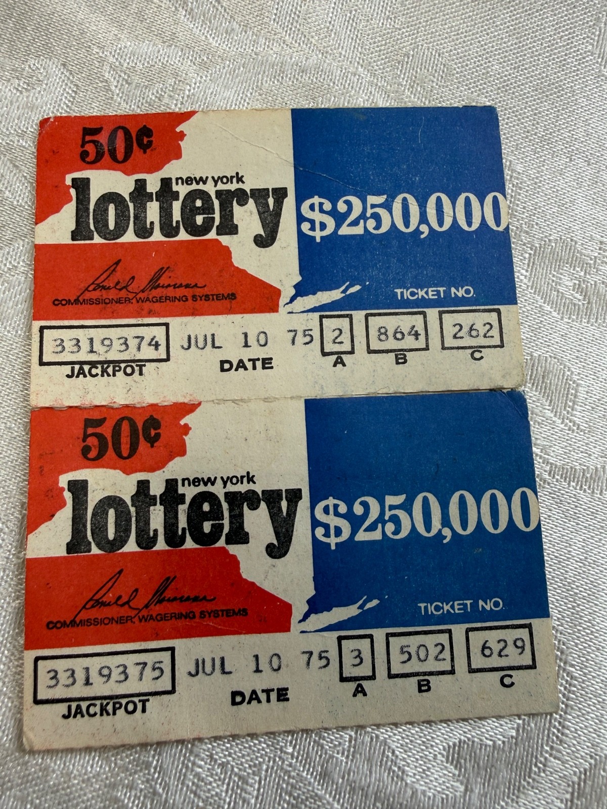 Two 1975 New York Lottery Tickets