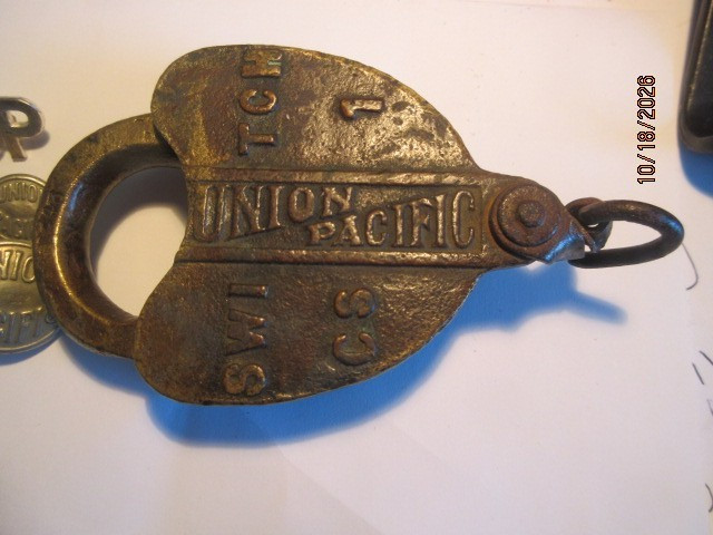 Antique Union Pacific Railroad Lock, buttons and badge group lot