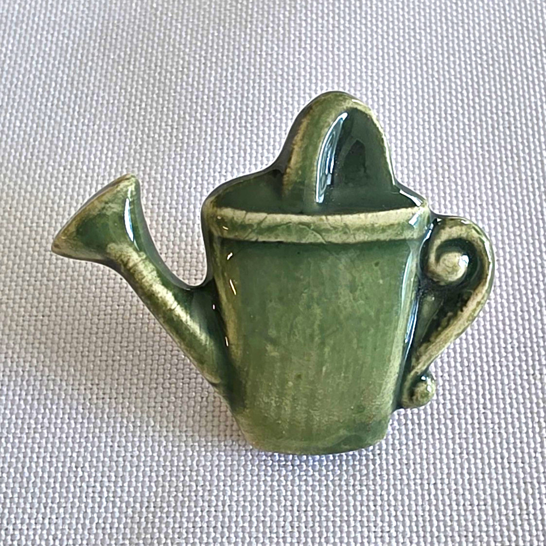 Vintage Green Ceramic Watering Can Lapel Pin USA Made Cottagecore Garden Brooch
