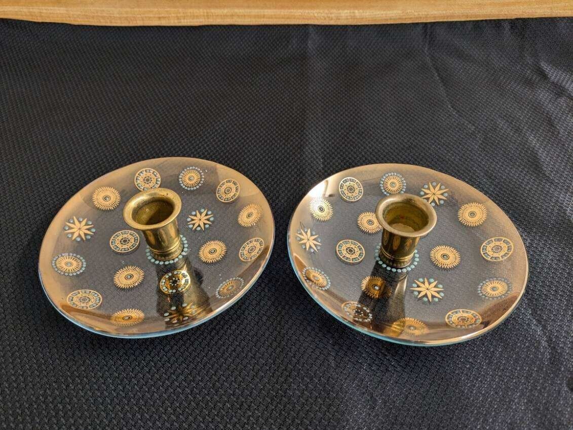 Vtg. MCM glass/brass circular starburst candleholder pair.