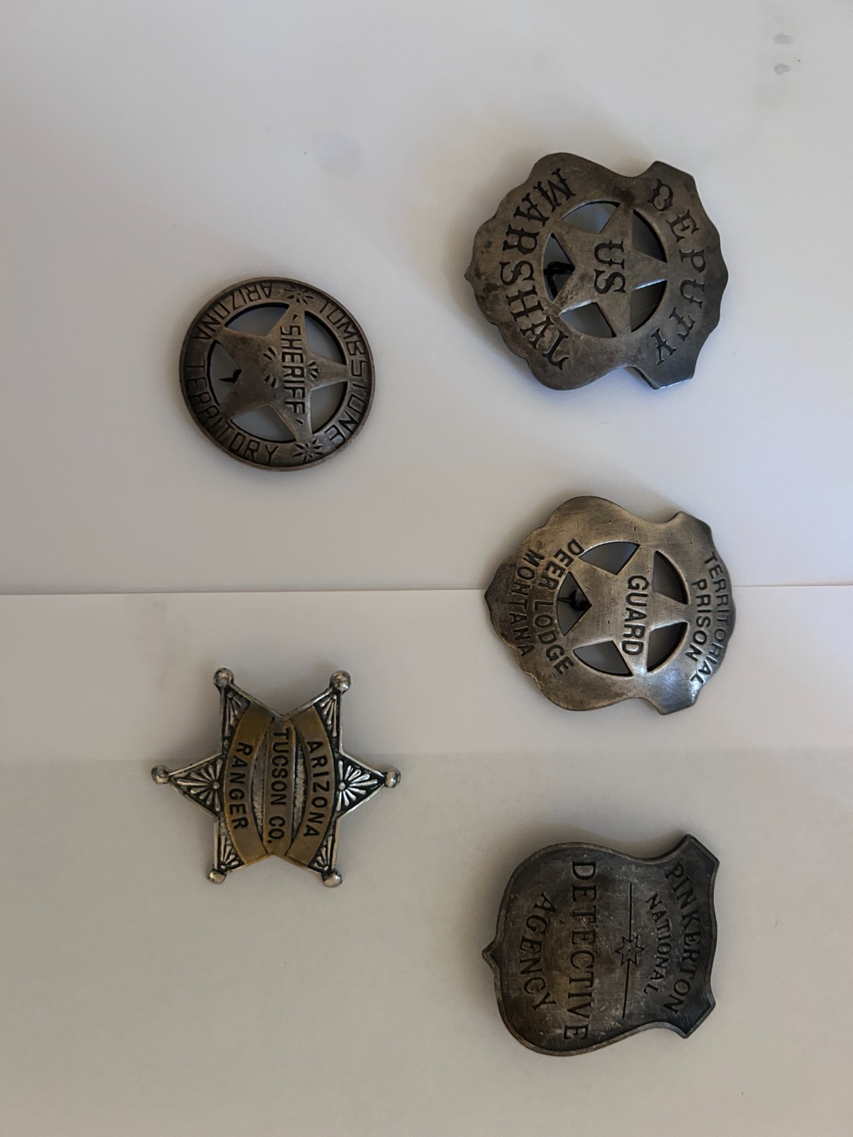 Five antique style Old West replica lawmen badges made of heavy metal Five antique style Old West replica lawmen badges made of heavy metal