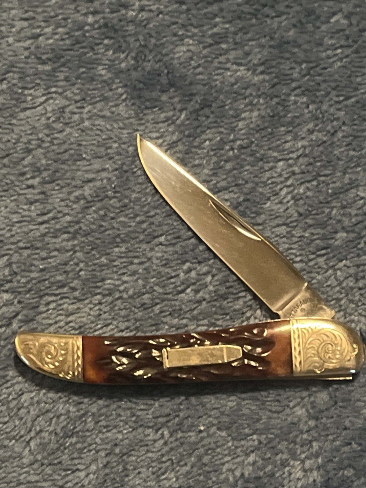 Unused Cattaraugus CM-12 Pocket Knife Beautifully Scrolled, Lever Lock, Bone Unused Cattaraugus CM-12 Pocket Knife Beautifully Scrolled, Lever Lock, Bone