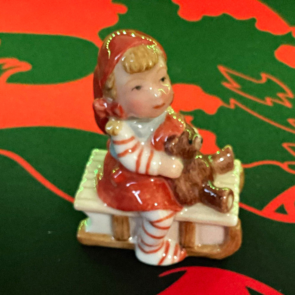 Royal Copenhagen Collections # 764 pixie elf on a sleigh Royal Copenhagen Collections # 764 pixie elf on a sleigh
