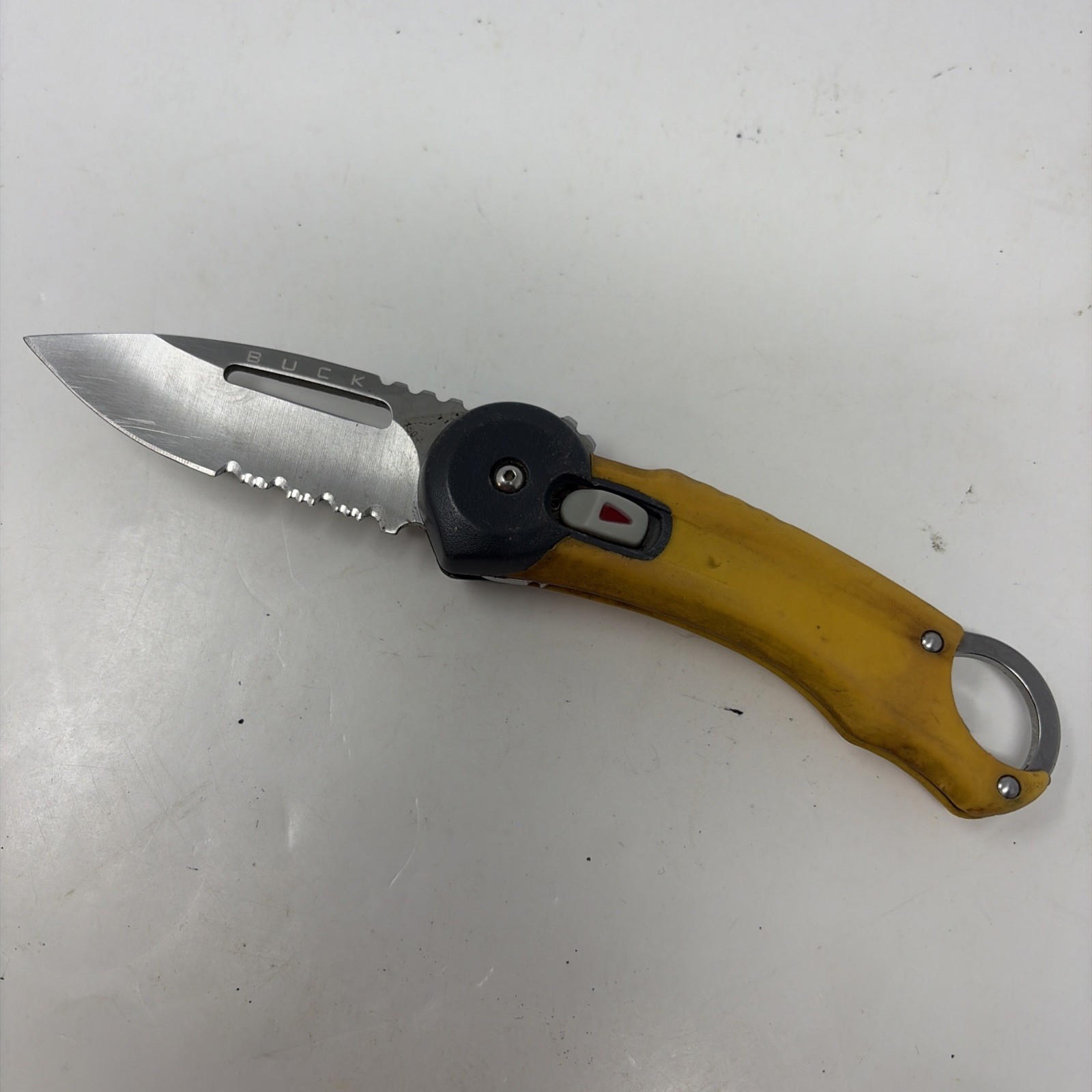 Gray and Yellow Buck Pocketknife 750 Serrated SafeSpin Slide-Lock Knife