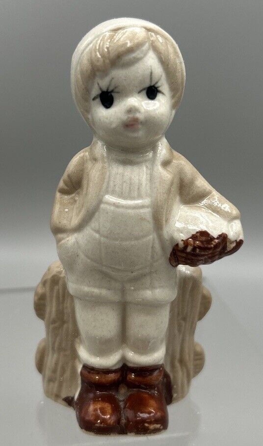 Vintage Young Boy Standing by Fence Porcelain Figurine