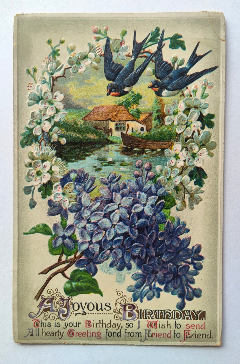 Vintage 1912 JOYOUS BIRTHDAY GREETING Postcard BLUE WHITE FLOWERS BIRDS Embossed