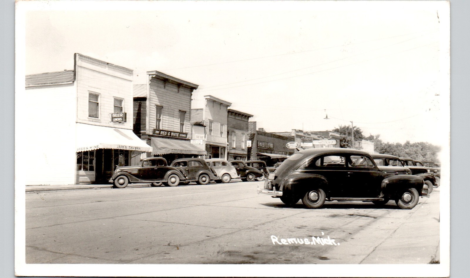 DOWNTOWN STREET remus mi c1940 postcard michigan real photo rppc