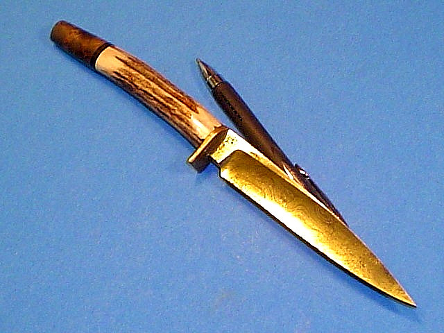 VINTAGE CHUCK STAPEL DAMASCUS KNIFE~~some damage