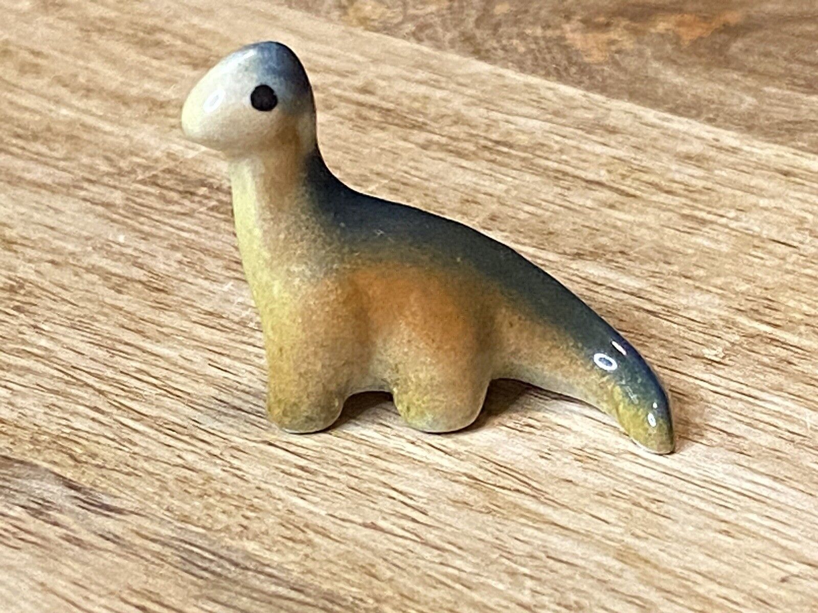 VTG Porcelain Mini Figurine Dinosaur Sauropod Herbivore Green  Orange Very Rare