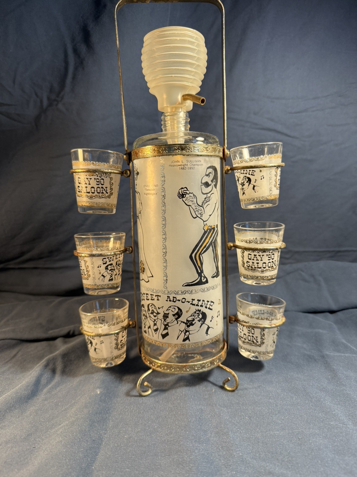 MCM Gay 90s Saloon Shot Glasses and Seltzer Bottle with Holder MCM Gay 90s Saloon Shot Glasses and Seltzer Bottle with Holder