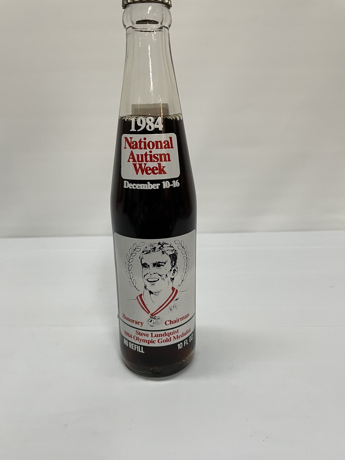 Vintage 1984 National Autism Week Coca Cola Bottle (FULL) 