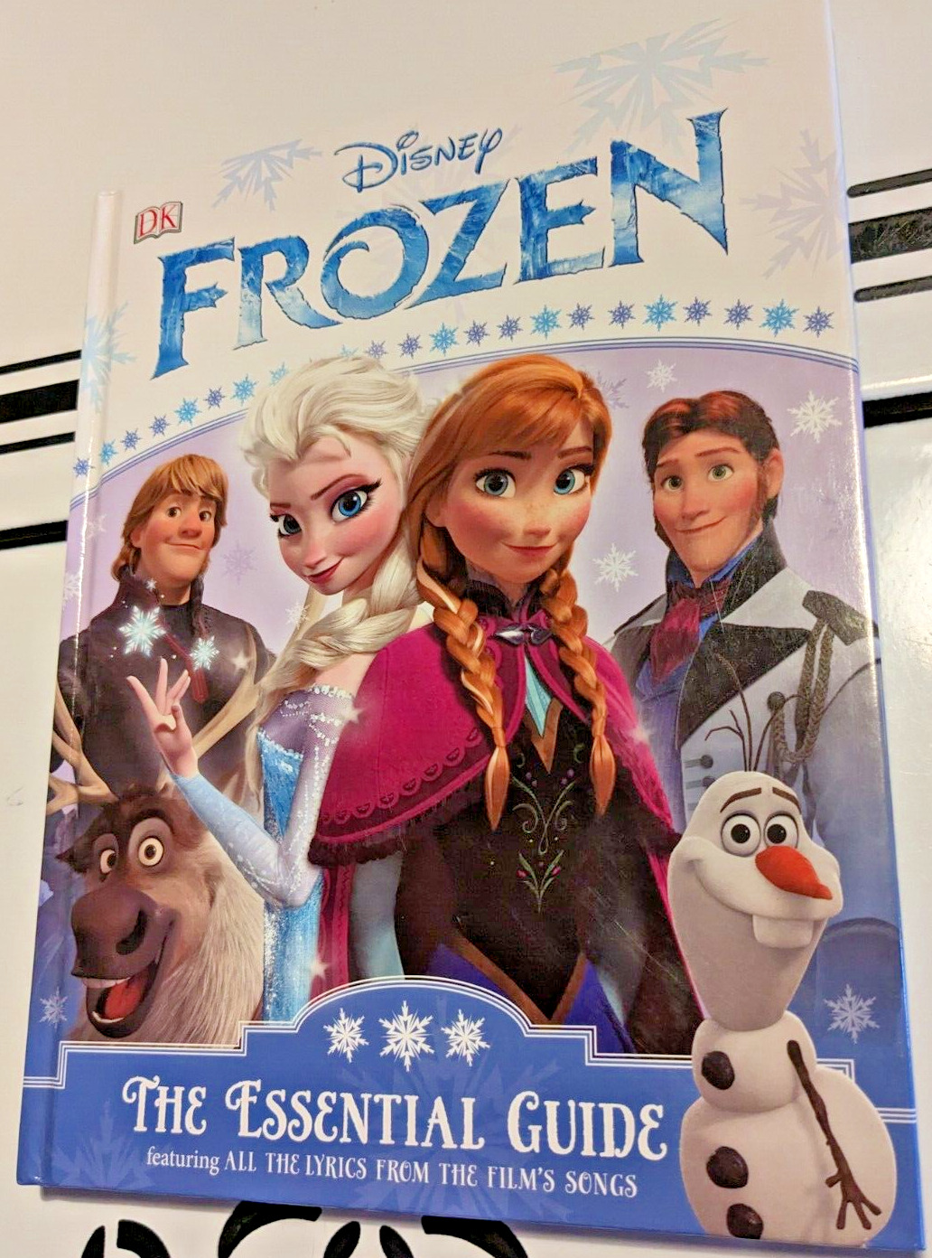 Disney Frozen the Essential Guide Hardcover, 1st Edition, 2014.