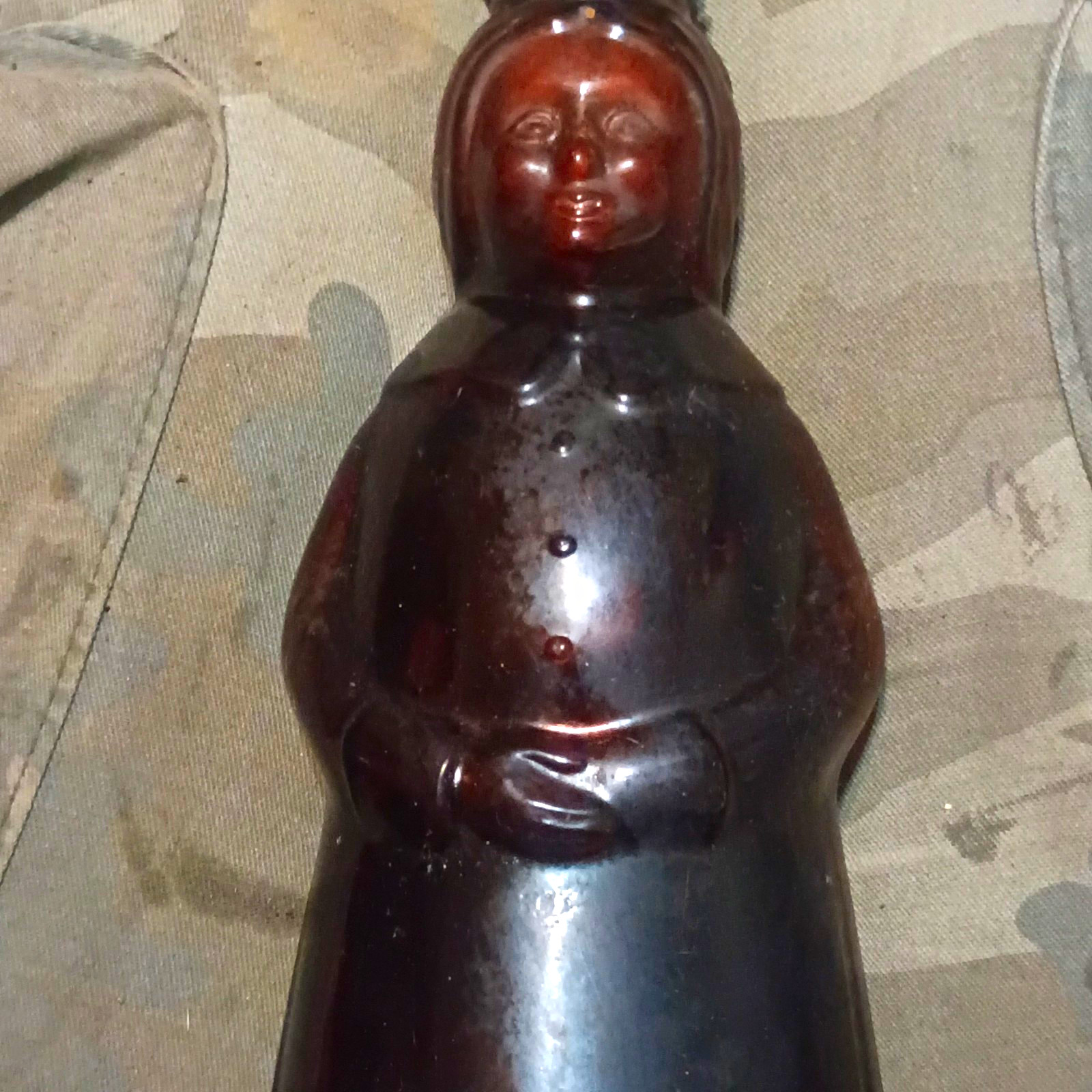 Brown/Amber Glass Girl Figural Bottle, Embossed Bow, Base Marked 6529, 84 oz