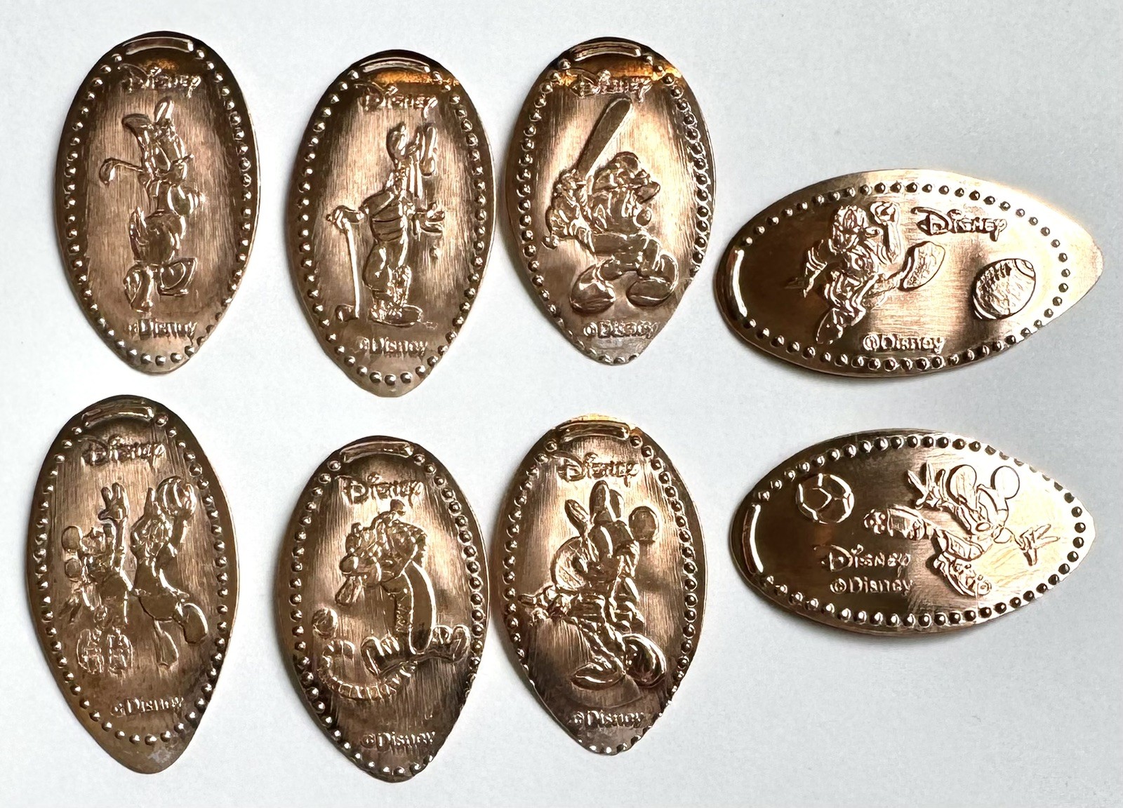 RETIRED Disney World Smashed Pressed Elongated Penny Set Of 8 Sports Mickey Coin