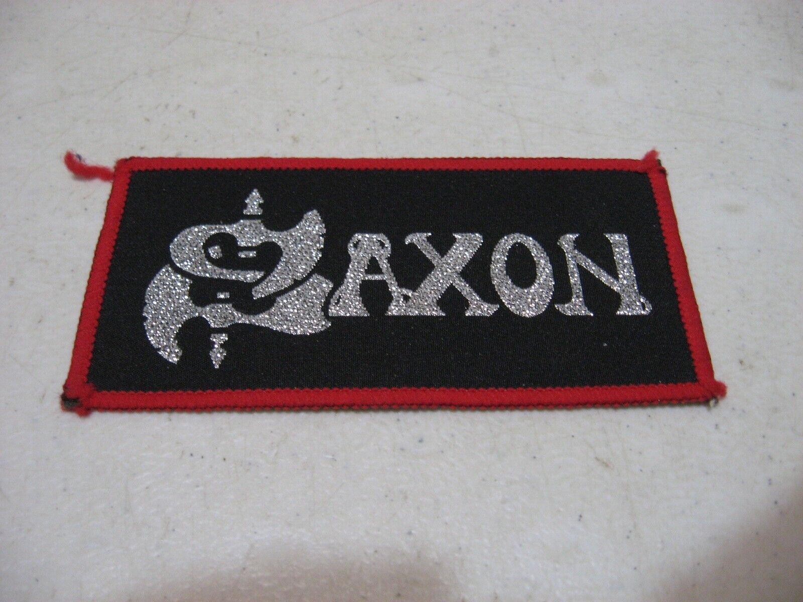 Vintage 1980s Saxon Glitter Logo Sew On Patch