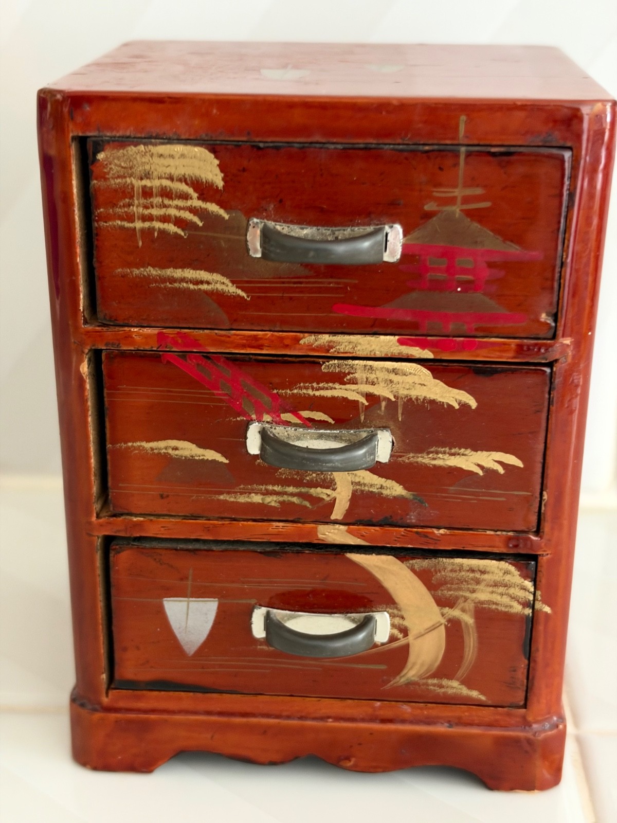 Japanese miniature hand-painted brown lacquered vintage three drawer chest Japanese miniature hand-painted brown lacquered vintage three drawer chest