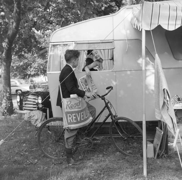 Paper boy delivering a newspaper a sleepy woman Caravan Club ca- 1959 Old Photo
