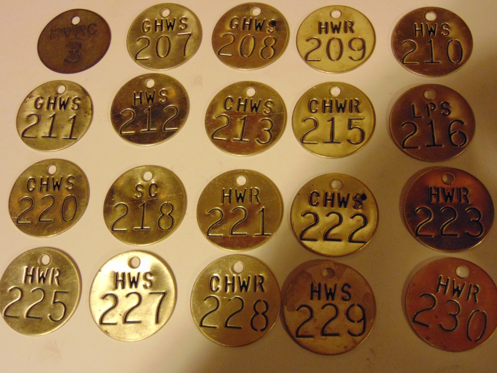 Lot of 20 used vintage misc Industrial Brass numbered tags 1.5 inch diameter