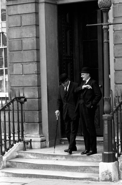 Two British men tie bowler hat leaving a building London 1960s Old Photo