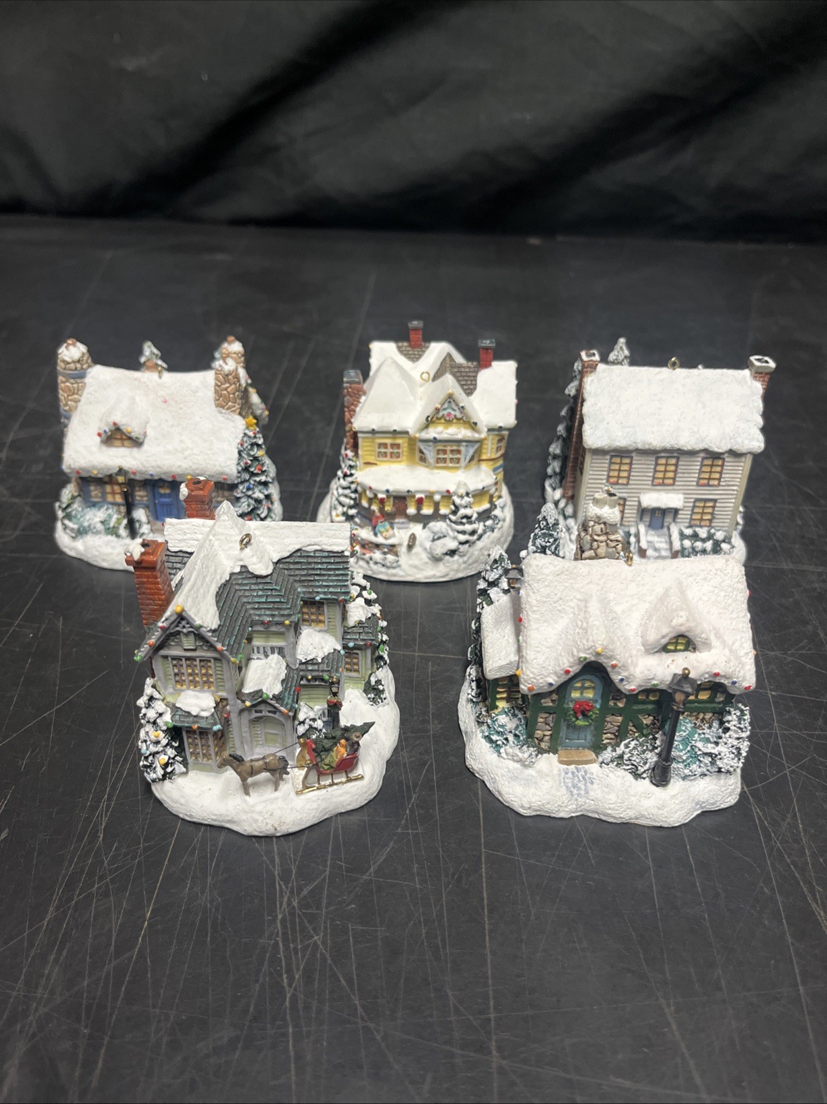 Thomas Kincaid’s winter memories illuminated ornament collection