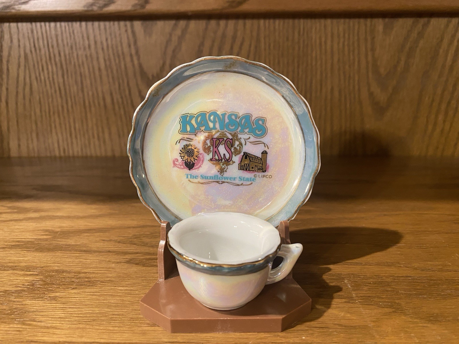 VINTAGE Miniature Souvenir Tea Cup Saucer & Stand STATE of KANSAS by LIPCO