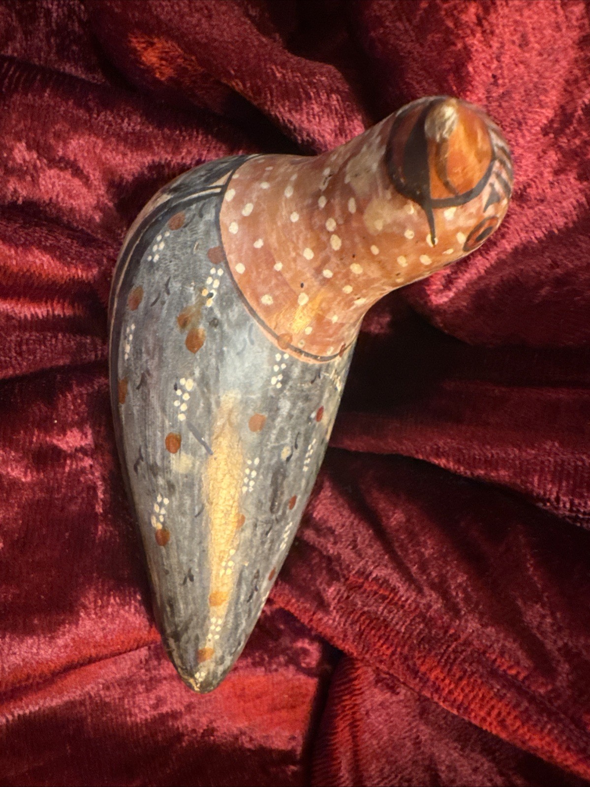 a vintage hand-painted Mexican Tonalá pottery bird figurine a vintage hand-painted Mexican Tonalá pottery bird figurine