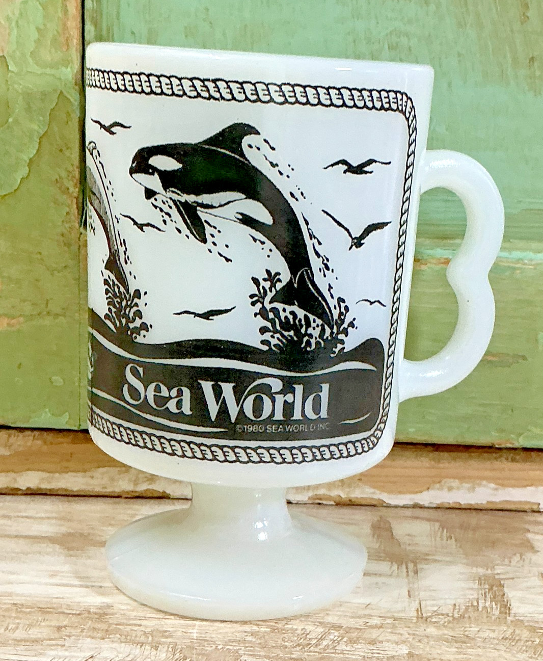Vintage 1980 Sea World Orca Dolphin Milk Glass Pedestal Coffee Mug Cup