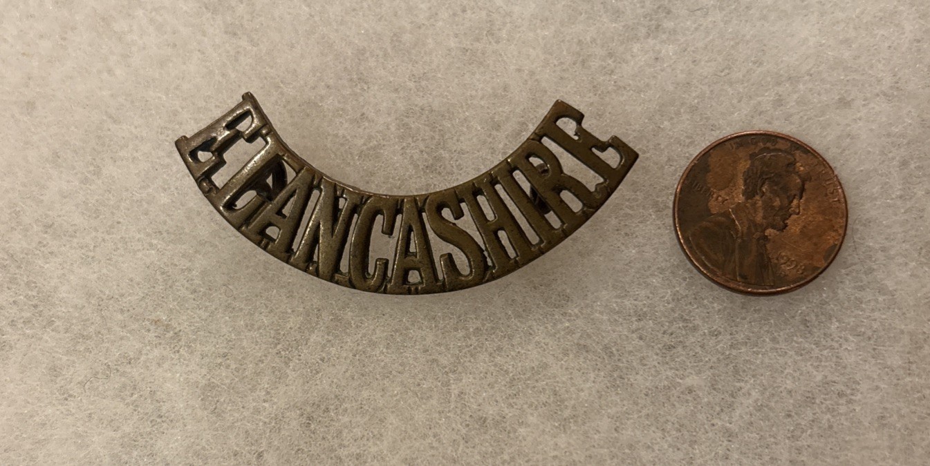 WWI British Army Brass Shoulder Title - East Lancashire Regiment