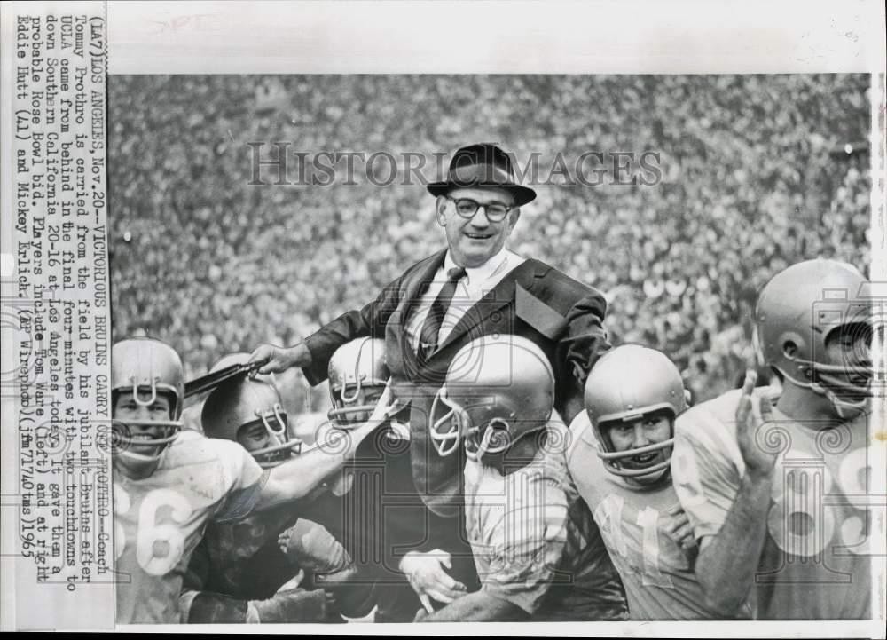 1965 Press Photo UCLA Coach Tommy Prothro carried off field in Los Angeles 1965 Press Photo UCLA Coach Tommy Prothro carried off field in Los Angeles