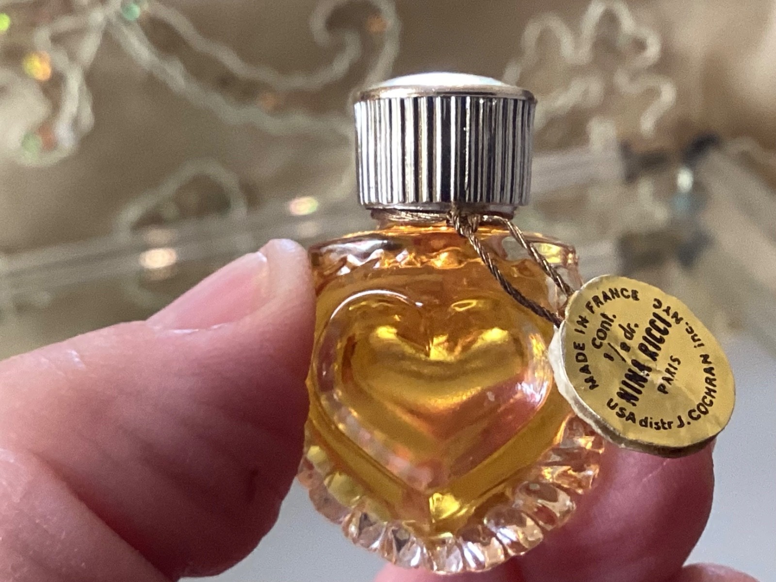 Couer joie Nina Ricci vintage mini heart bottle perfume with tag and box.