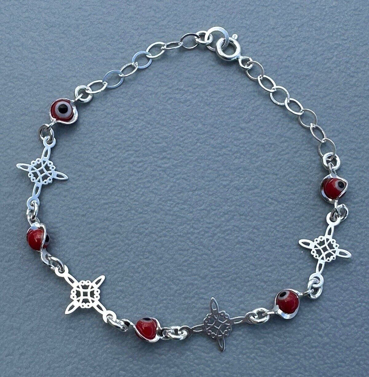 TAXCO 9.25 Sterling Silver Bracelet With Witch\'s Knot And Red Turkish Eye 2.7g.