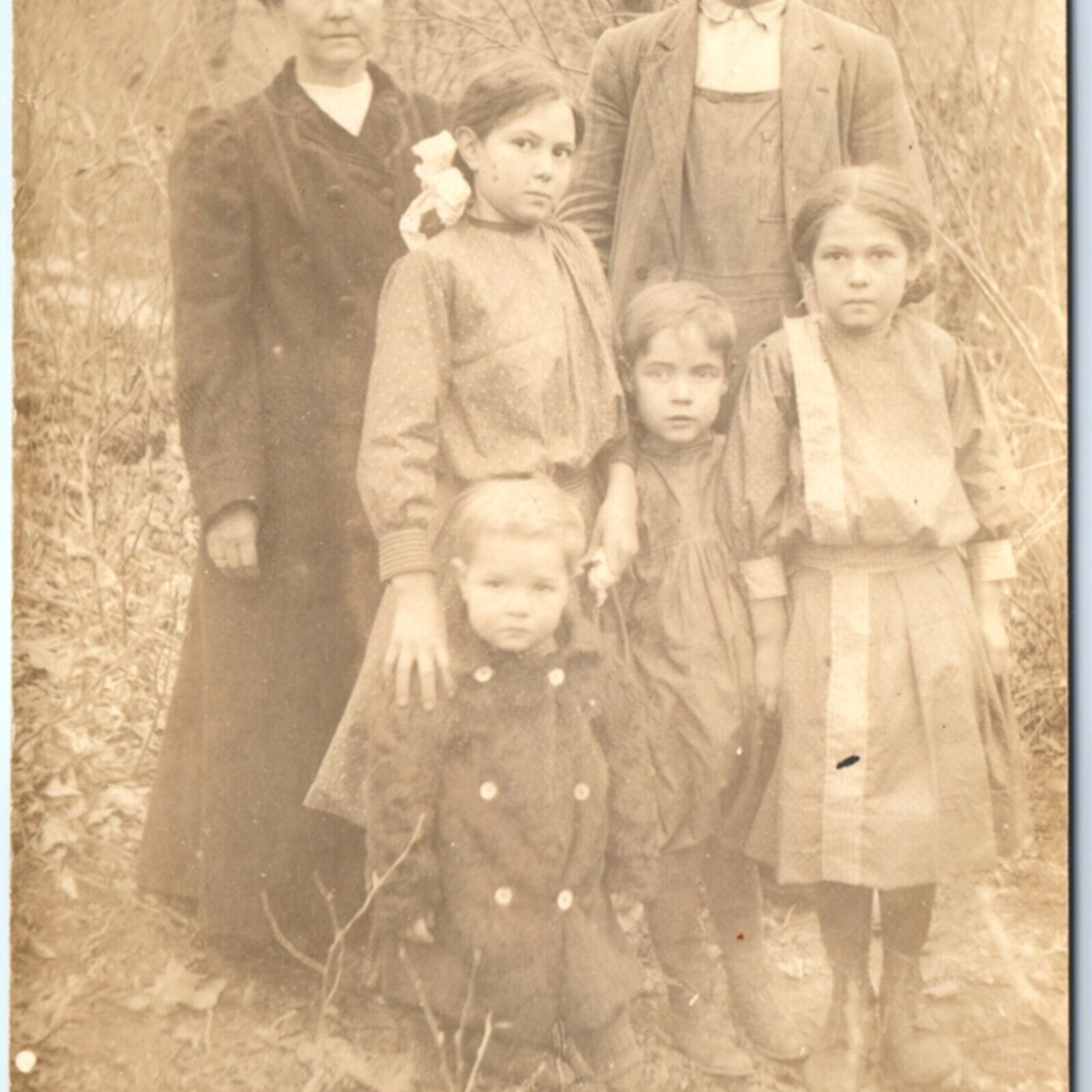 c1910s Big Family in Woods RPPC Unhappy Woman Cute Boys Girls Real Photo PC A139