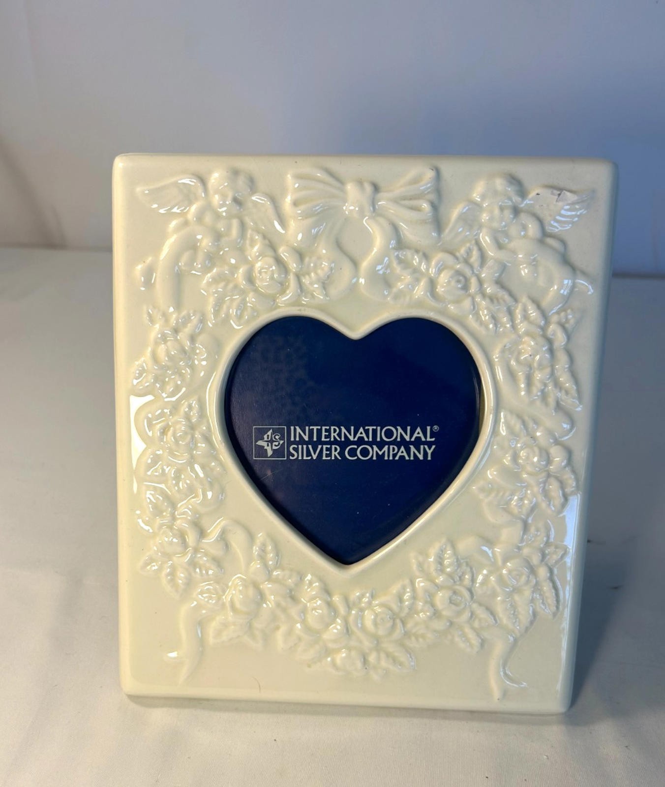 International Silver Company Porcelain Baby Frame Heart Cherubs Roses Keepsake G International Silver Company Porcelain Baby Frame Heart Cherubs Roses Keepsake G