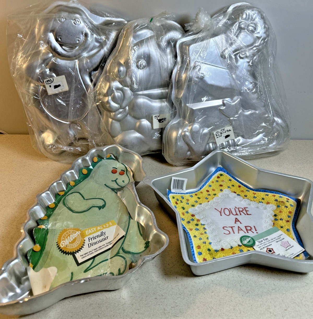 Lot of 5 Vintage Wilton Cake Pans, Barney Big Bird, Dino, Teddy Bear Star Lot of 5 Vintage Wilton Cake Pans, Barney Big Bird, Dino, Teddy Bear Star